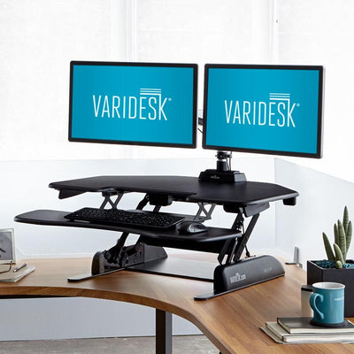 corner standing desk by varidesk