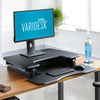 varidesk pro plus 30 standing desk seated